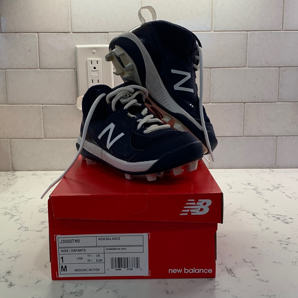 New Balance Baseball Cleats size 1, mid tops